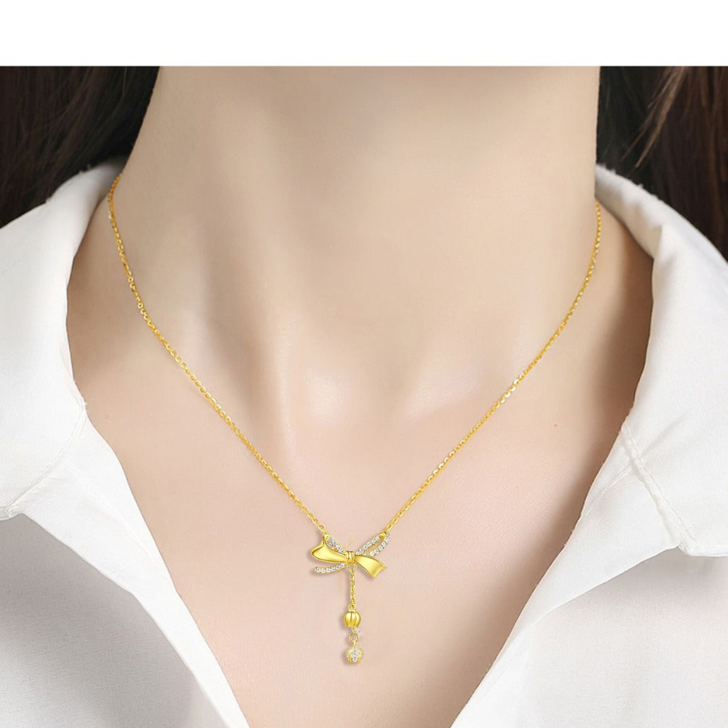 Collar de plata de ley con lazo, colgantes de campanillas y cadena rolo